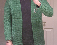 Malabrigo merino Worsted Yarn, color 117 verde adriana cardigan sweater