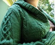 Central Park Hoodie handknit cardigan shown in Malabrigo merino Worsted Yarn, color 117 verde adriana