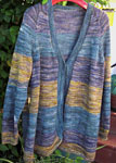 Hank knit striped cardigan sweater with Malabrigo Merino Sock Yarn color aguas, turner and playa