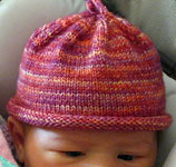 Hand-knit child's hat with Malabrigo merino Sock Yarn color archangel