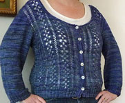 Hand knitted cardigan knit with Malabrigo Sock yarn color azules