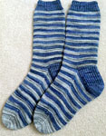 Hand knit multi-colored socks knit with Malabrigo Sock yarn color azules & natural
