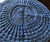 Hand knit tam knit with Malabrigo Sock yarn color azules