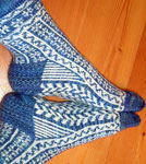Hand knit multi-colored socks knit with Malabrigo Sock yarn colors azules & natural