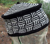 Toque, Yo by Rosemary (Romi) Hill  in black and natural