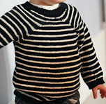 20.	Cool Summer child’s striped pullover sweater by Lili Comme Tout  in black and natural