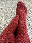 Hand-knit socks with Malabrigo Merino Sock Yarn color botticelli red