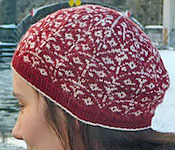 Hand-knit fair isle hat/tam with Malabrigo Merino Sock Yarn color botticelli red and natural