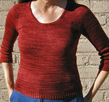 Hand-knit pullover sweater with Malabrigo Merino Sock Yarn color botticelli red