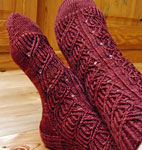 Hand-knit socks with Malabrigo Merino Sock Yarn color botticelli red