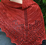 Hand-knit lacey scarf/shawl with Malabrigo Merino Sock Yarn color botticelli red