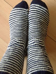 Hand knit socks knit with Malabrigo sock yarn cote d azure and natural