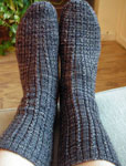 Hand knitted socks using Malabrigo Sock Yarn color eggplant