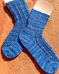 Hand knit cabled socks with Malabrigo Merino Sock Yarn color impressionist sky