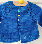 Hand knit child's cardigan sweater with Malabrigo Merino Sock Yarn color impressionist sky