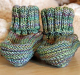 Hand knit booties with Malabrigo Merino Sock Yarn color indiecita