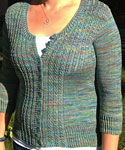 Hand knit cardigan cabled sweater with Malabrigo Merino Sock Yarn color indiecita