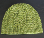 Hand-knit cabled hat with Malabrigo Merino Sock Yarn color lettuce