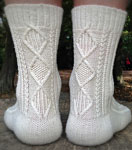 Malabrigo Merino Sock Yarn color natural hand-knitted cable stitch socks