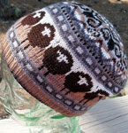 Malabrigo Merino Sock Yarn colors eggplant and natural hand-knitted fair isle hat