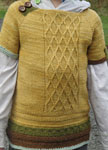 Hand-knit short sleeved pullover sweater made with Malabrigo Merino Sock Yarn color ochre