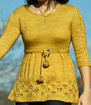 Hand-knit long sleeve tunic sweater made with Malabrigo Merino Sock Yarn color ochre