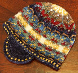 Hand-knit fair isle hat/tam made with Malabrigo Merino Sock Yarn color ochre