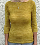 Hand-knit long sleeved pullover sweater made with Malabrigo Merino Sock Yarn color ochre