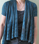 Hand-knit open front cardigan using Malabrigo Merino Sock Yarn color persia