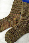 Hand-knit ribbed socks made with Malabrigo Merino Sock Yarn color primavera