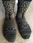 Hand-knit socks with tree of life pattern made with Malabrigo Merino Sock Yarn color primavera