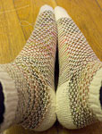 Hand-knit broken seed stitch socks made with Malabrigo Merino Sock Yarn colors primavera