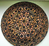 Hand-knit hat/tam made with Malabrigo Merino Sock Yarn colors primavera and black
