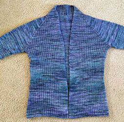 Open front cadigan sweater hand knit with Malabrigo Merino Sock Yarn color azules