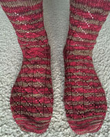Diagonal Lace Socks hand knit with Malabrigo sock yarn color stonechat