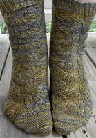 Embossed Leaves socks knit with Malabrigo Merino Sock Yarn color turner
