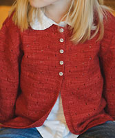 Leonie child's sweater hand knit with Malabrigo sock yarn color ravelry red