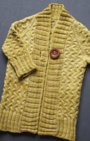 Tiny Rocky Coast Sweater hand knit with Malabrigo sock yarn color ochre