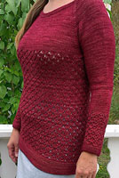 Poolside abled pullover crew neck sweater knit with Malabrigo Merino Sock Yarn color tiziano red