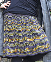 Skirt hand knit with Malabrigo Merino Sock Yarn colors turner, eggplant, black and ochre