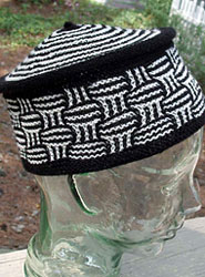 Toque hand knit with Malabrigo sock yarn color black & natural
