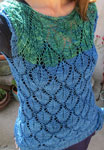 Hand-knit sweater vest knit with Malabrigo Merino Sock Yarn colors solis and impressionist sky