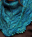 Hand-knit lace scarf/shawl knit with Malabrigo Merino Sock Yarn color solis