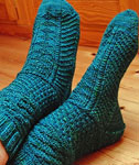 Hand-knit socks knit with Malabrigo Merino Sock Yarn color solis