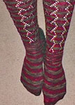 Long socks hand knit with Malabrigo Merino Sock Yarn color stonechat