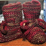 Baby booties hand knit with Malabrigo Merino Sock Yarn color stonechat