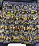 Hand knit skirt knit with Malabrigo Merino Sock Yarn colors turner and eggplant