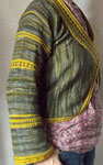 Hand knit open front cardigan sweater knit with Malabrigo Merino Sock Yarn color turner