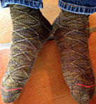 Hand knit socks knit with Malabrigo Merino Sock Yarn color turner