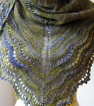 Hand knit lacey scarf/shawl knit with Malabrigo Merino Sock Yarn color turner